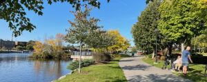 A photo of a path along a riverfront